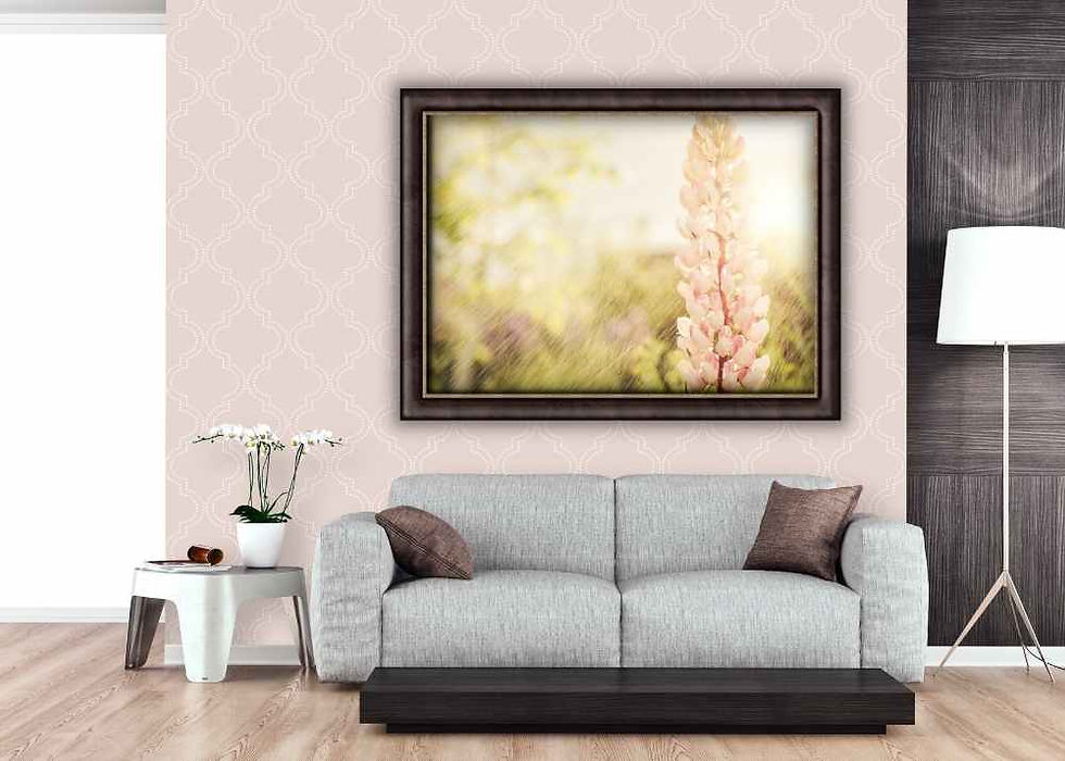 picture in dark brown frame hanging on pink wallpaper