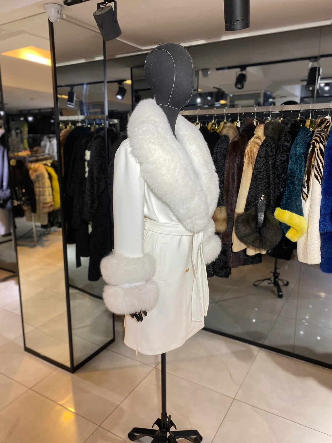 Faux fur top coat in store