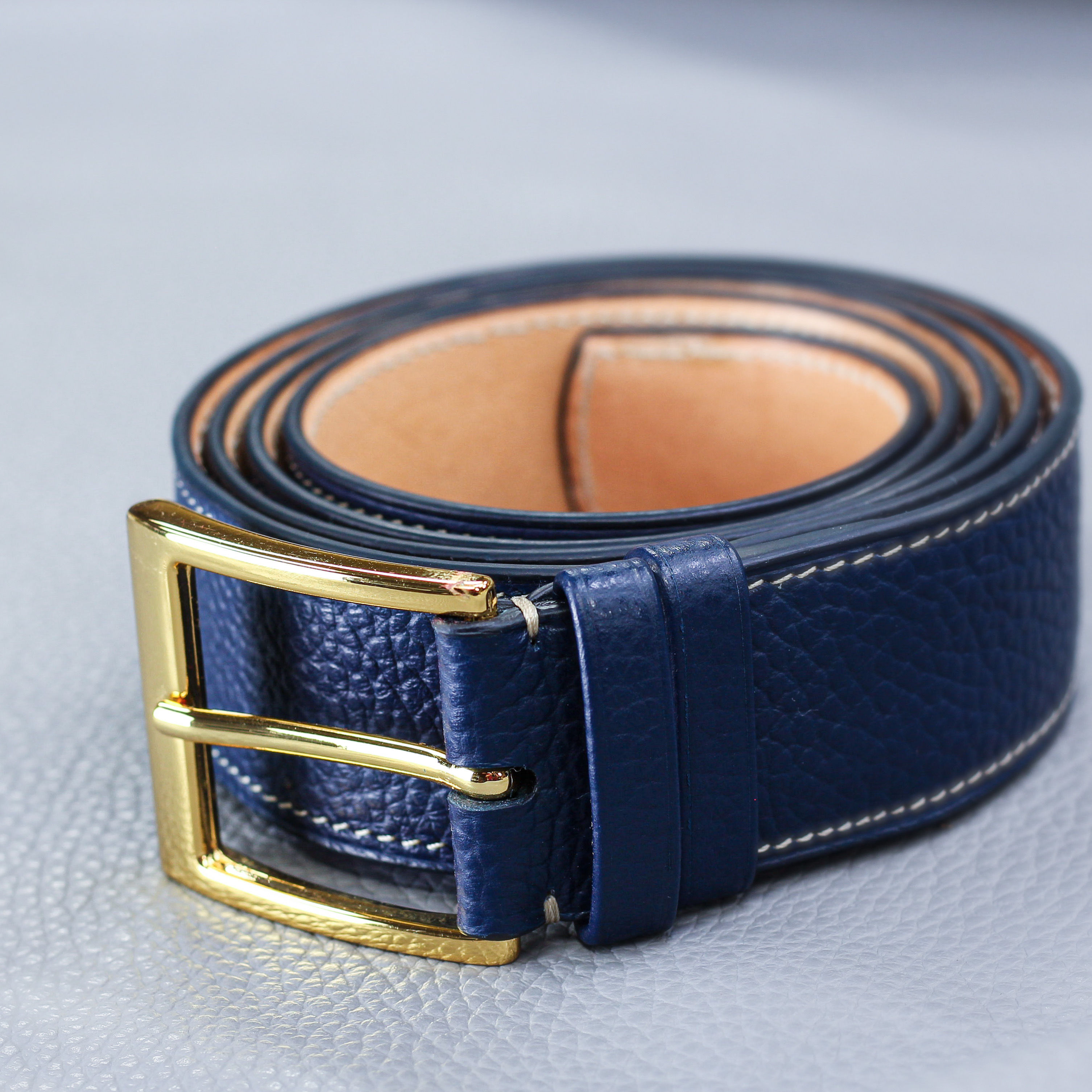 Blue calf belt rolled