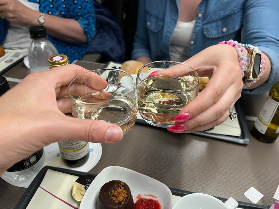 enjoying some wine on the train