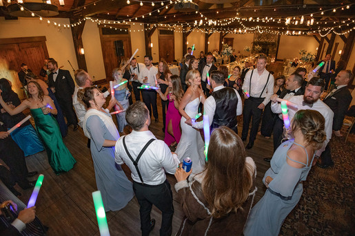 group of wedding party guests on the dance floor during Calgary wedding planning event