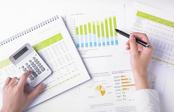 Ajaib: person calculating risk on paper