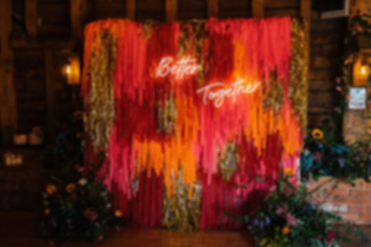 Red, Pink and gold streamer backdrop