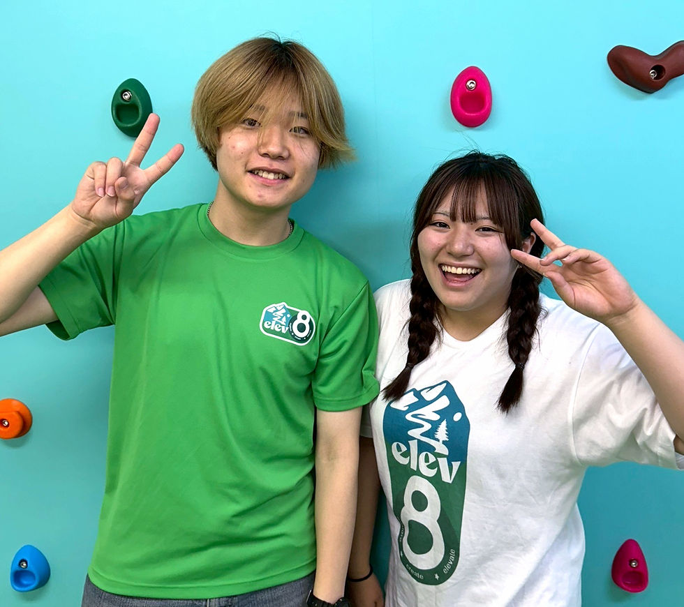 Masahiro and Koyuki smiling and posing together at Elev8 summer camp in Tokyo, showcasing our passionate bilingual teaching team