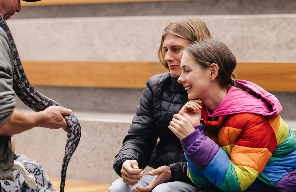 Peppa from Spacey Jane and Tom from the Moving Stills meeting the resident snake