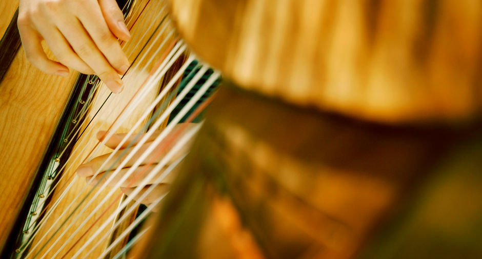 Playing harp
