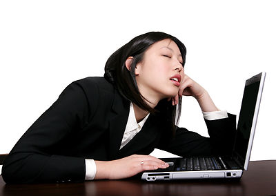 Lady sleeping on Computer.jpeg