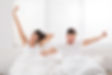 Image Couple Waking Up Happy.jpg