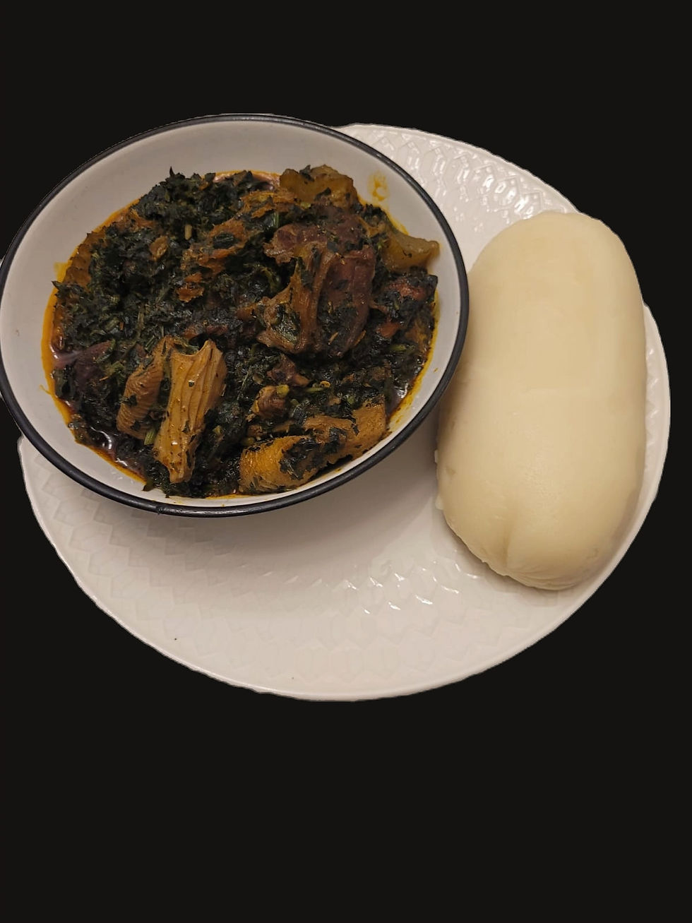 Nigerian Bitter‑Leaf Soup – Ofe Onugbu made with bitter‑leaf, cocoyam, palm oil, and assorted meats