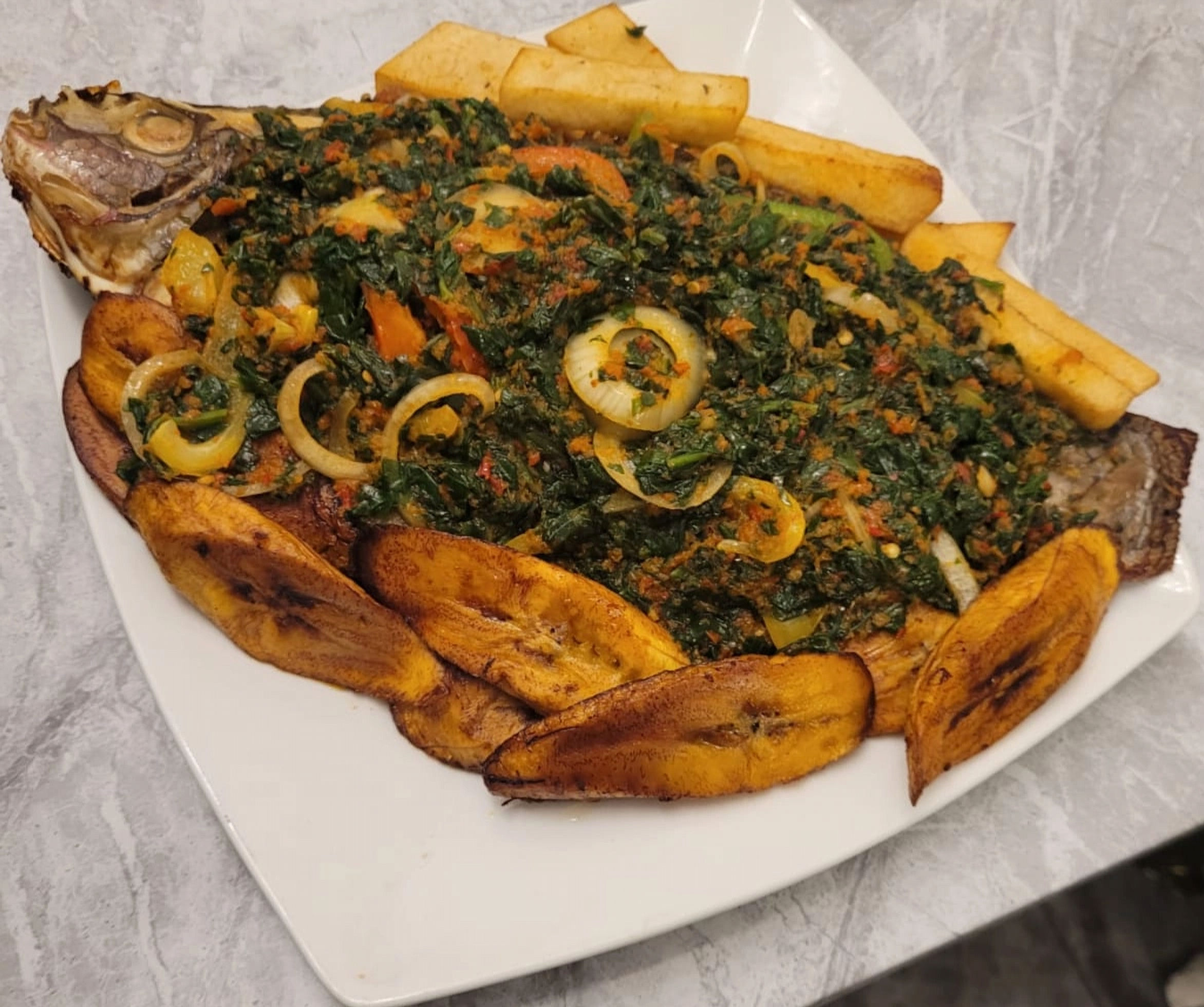 Grilled Croaker Fish – Nigerian spicy grilled croaker with peppers, onions, and herb
