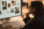 ROProjects Interior designer reviewing mood board and project images pinned to a wall
