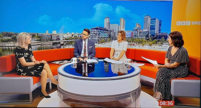 Jane Hawkes on BBC Breakfast panel discussing consumer rights, seated with three presenters on a red studio sofa.