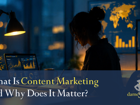 Silhouette of person working on a laptop in a dimly lit room. Screens show charts, maps. Text: "What Is Content Marketing and Why Does It Matter?" dameSpeak logo bottom right.