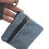 Thumbnail: Hand holding denim coin purse with metal zipper; a simple design.