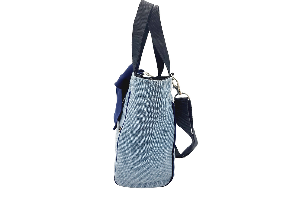 Thumbnail: Side view of denim tote bag with cross-body strap on white background.