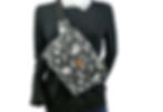 Woman wearing black paisley crossbody bag AWESOMEROSE'S showcasing style and design.
