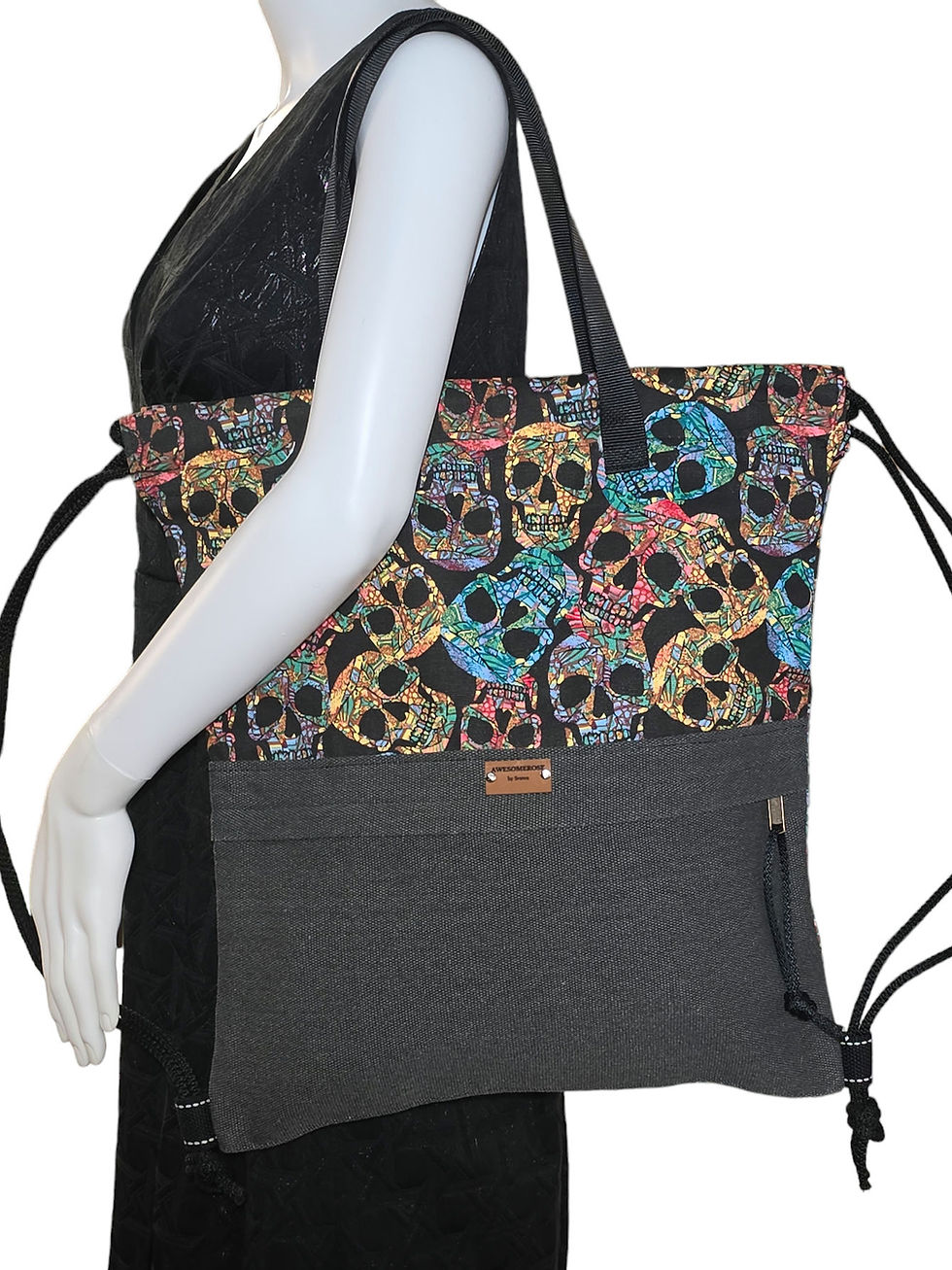 Thumbnail: Woman wearing black dress holding skull printed 2-way carrying small tote bag