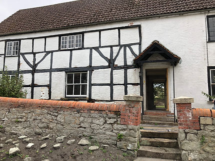 Timber and brick building past project of Stone Masonry