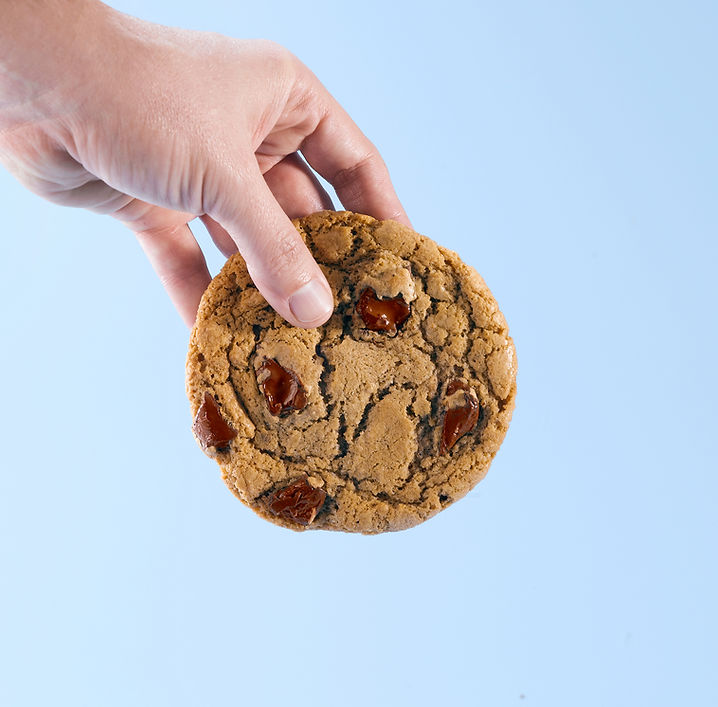 Hand Holding Cookie