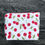 Thumbnail: handmade make-up bag with red cherries and green stalks and matching red zip