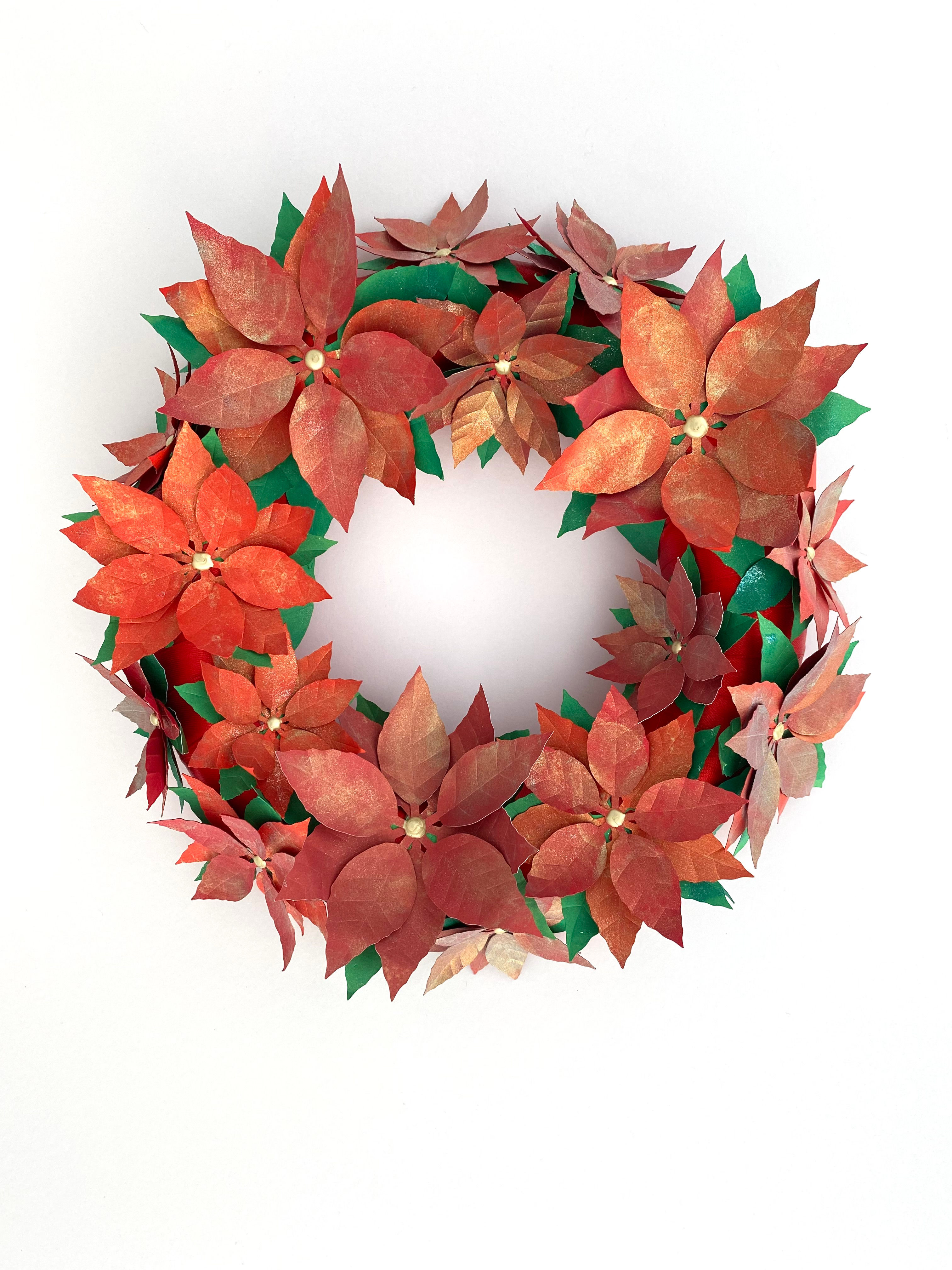 Paper Flower Poinsettia Christmas wreath with hanger in shades on red with gold shimmer details