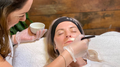 Client receiving a skin peel by Lacey at Luminous Skin in Richmond