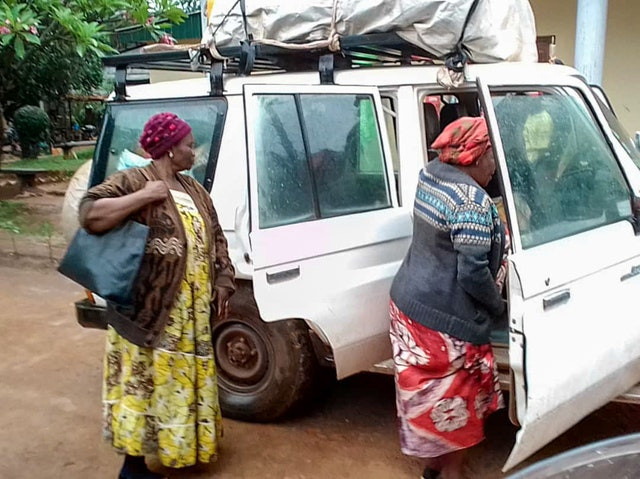 two women are shown getting into a white car
