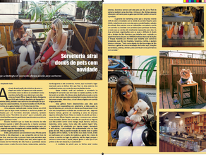 Reportagem em página dupla de revista