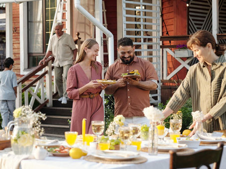 Couple spending time with family during a shared meal