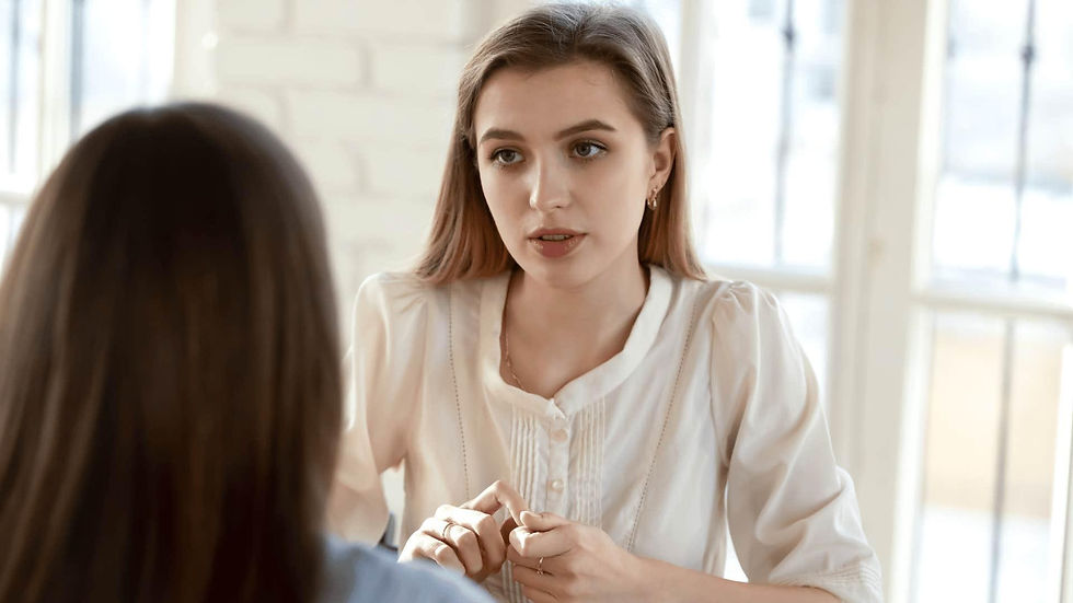 Woman having a calm and honest conversation about personal boundaries and emotional needs.
