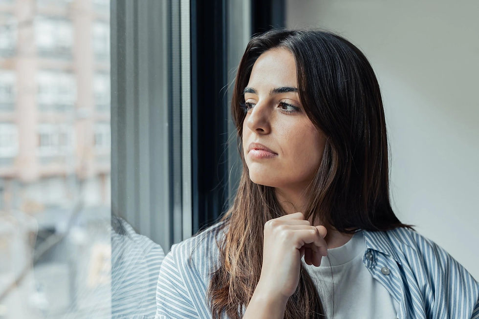 Woman reflecting on her thoughts and relationship