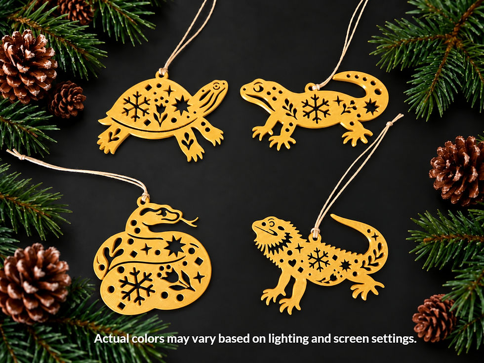 Four gold Nordic reptile Christmas ornaments: Bearded Dragon, Leopard Gecko, Red-Eared Slider Turtle, and Ball Python.