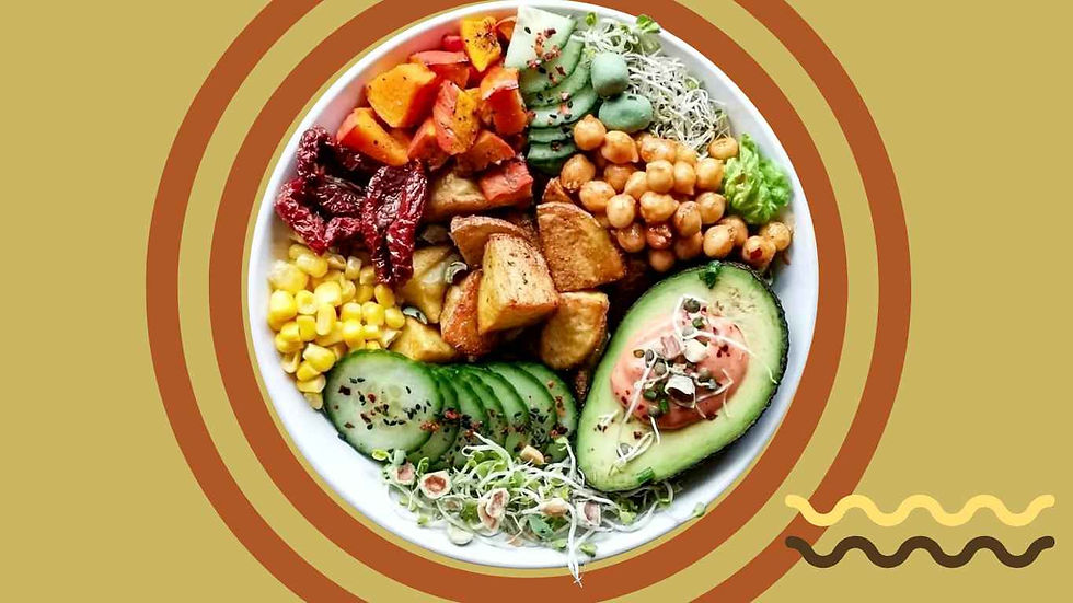 A bowl filled with salad arranged on a patterned background.
