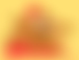Lightly breaded fried chicken pieces on a vibrant yellow background.