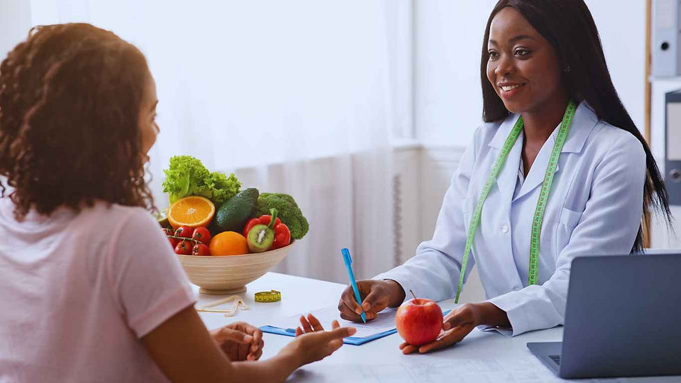 dietician giving young woman healthy diet tips