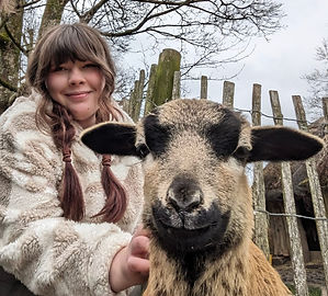 Olivia with a sheep