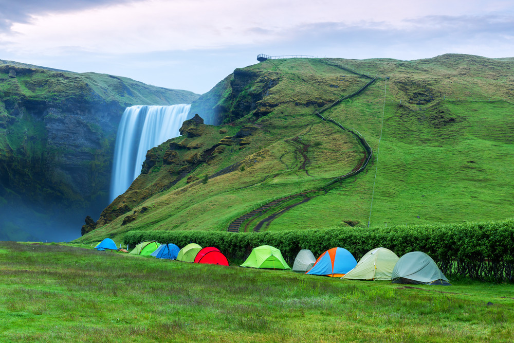 Campsites by a waterfall in south iceland - iceland camping law