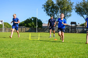 Rugby Coach at rugby Champs training camp kids fitness 