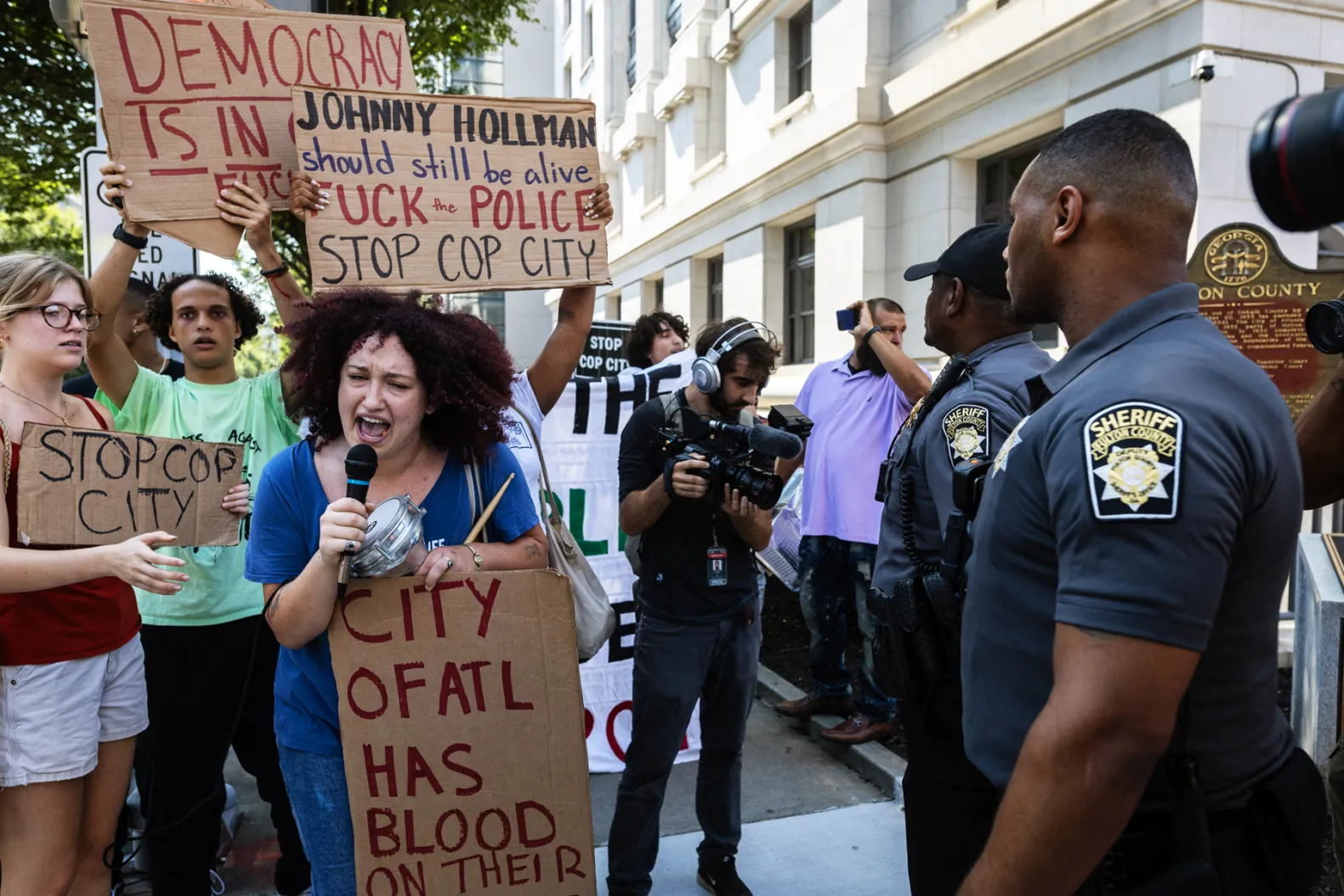 Cop-City-protesters-react-to-charges.webp