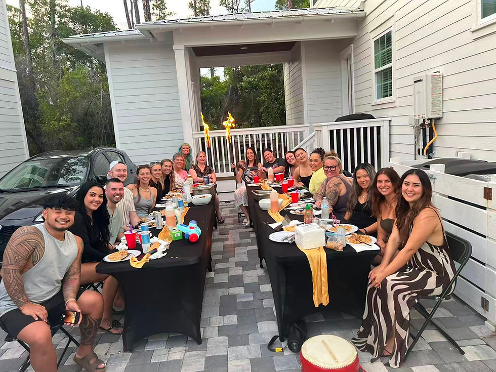 Backyard hibachi party setup with private chef cooking for guests