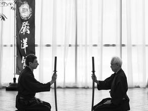 Seated reihō with bokutō before paired practice