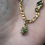 Thumbnail: Gold charm necklace 
