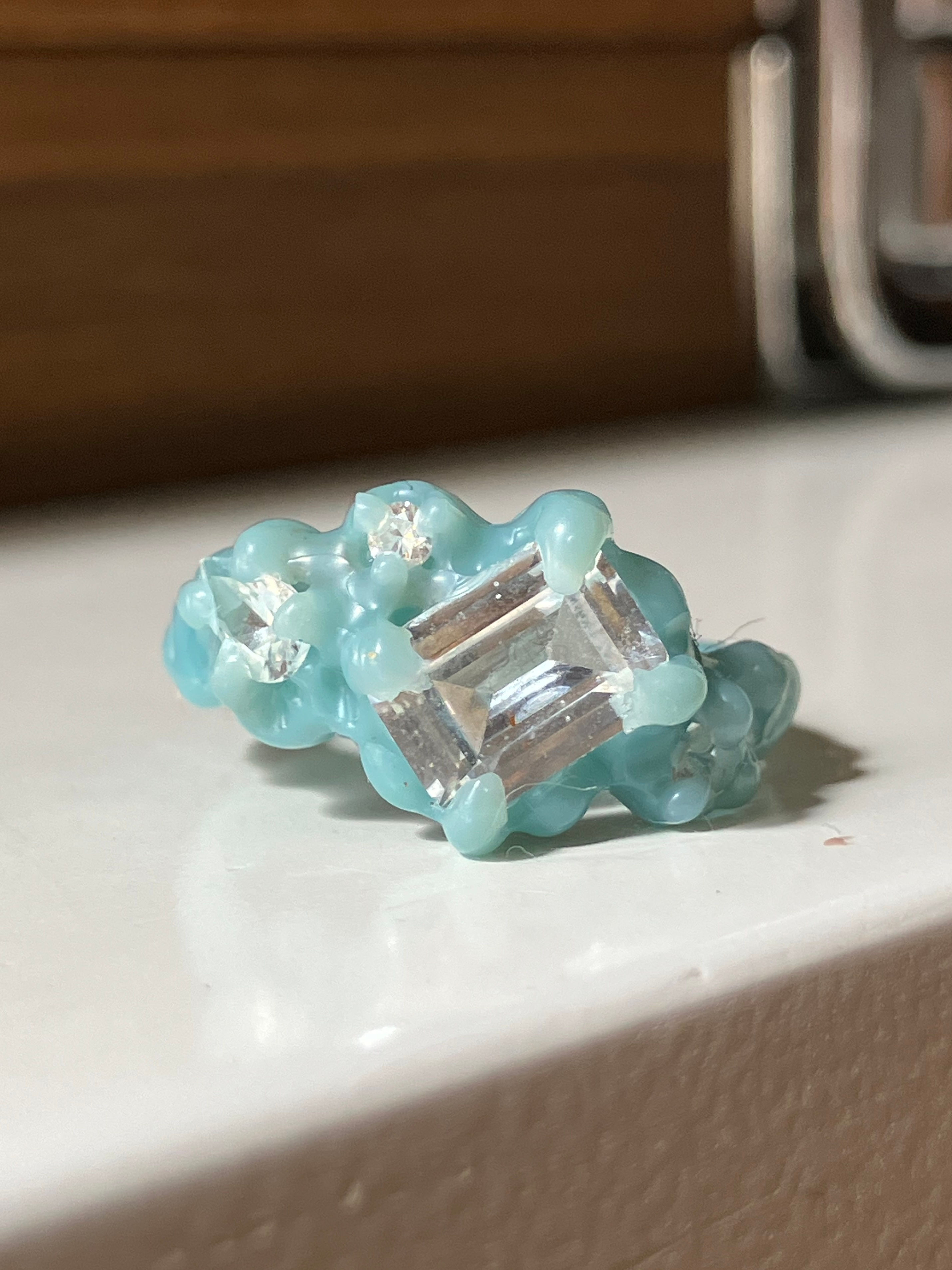 Molten white sapphire ring