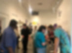 People at the Not Yet/Always Been exhibition gallery.