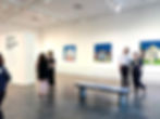 People at A House that Watches Back art gallery exhibit