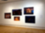 Art gallery wall with photos from A House that Watches Back