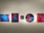 Art gallery wall featuring a portfolio of male figure paintings