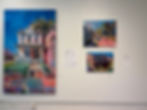 Art exhibition featuring paintings of houses that watches.