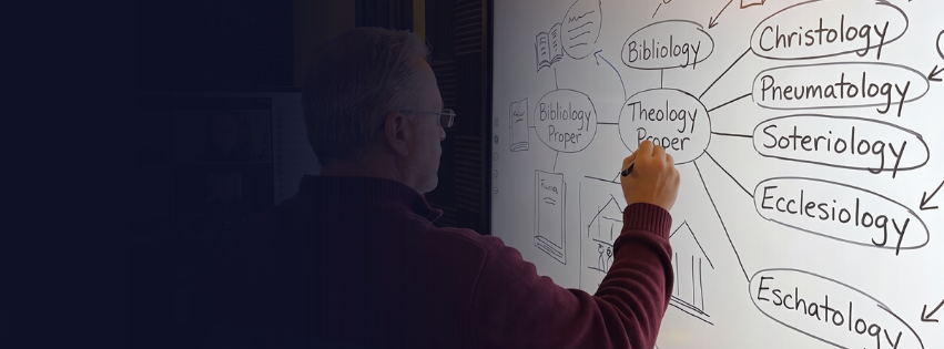 Professor mapping systematic theology on a whiteboard during a live New Geneva class
