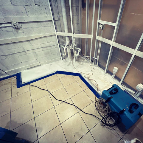 We brought in our "blue special machines"—industrial LGR dehumidifiers—to pull every ounce of moisture out of the kitchen’s framework.